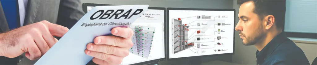 Engenheiro da OBRAP desenvolvendo projeto de sistema de pressurização de escadas em ambiente corporativo, com modelagem técnica HVAC exibida em monitores